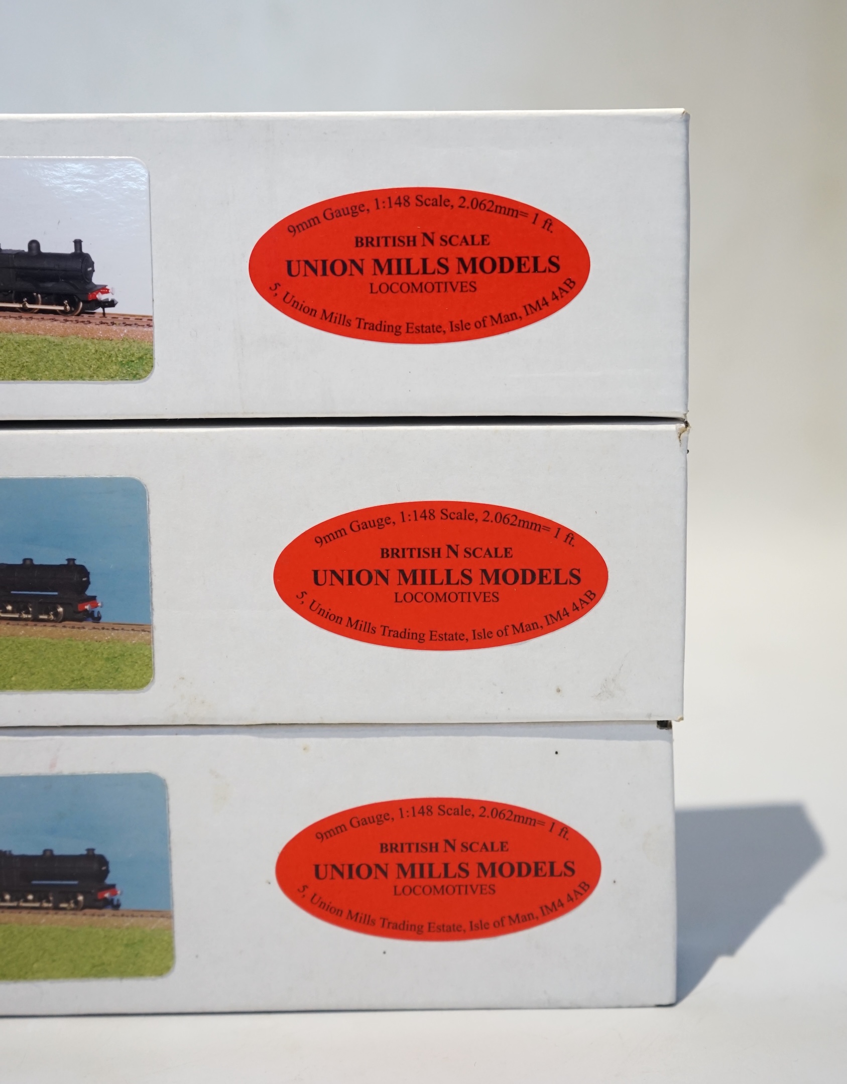 Three boxed Union Mills Models N gauge railway BR locomotives; a Class 7F, 49659, a Class 7F, 49508, and a Class 3F, 43214. Condition - good.